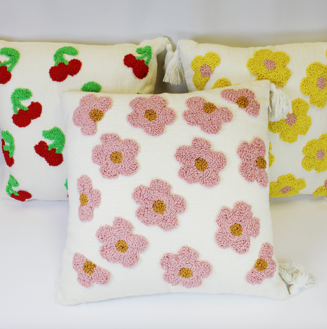 Embroidered Pillow with Tassels