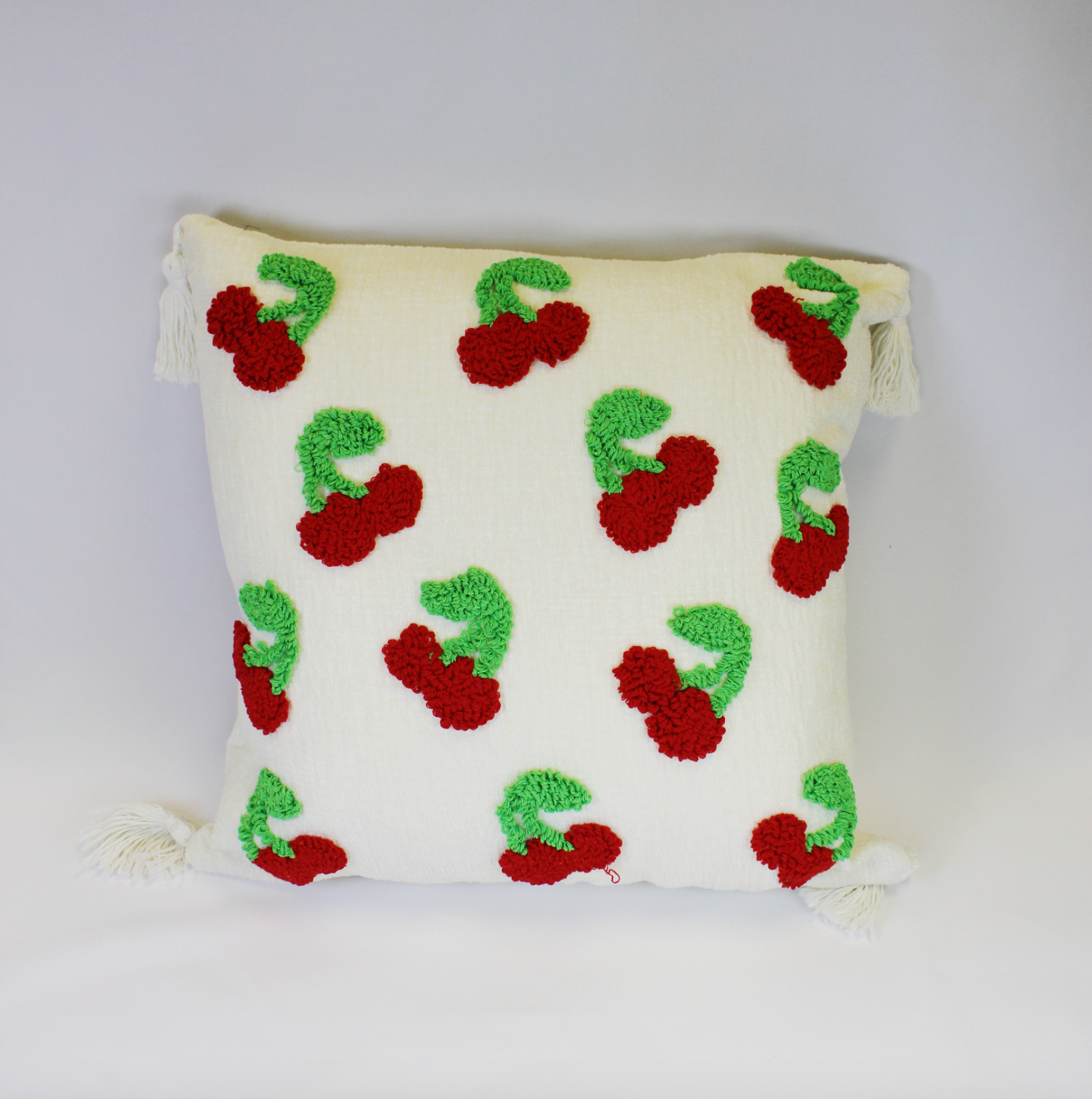 Embroidered Pillow with Tassels